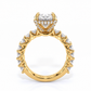 Desire engagement ring side view in yellow gold