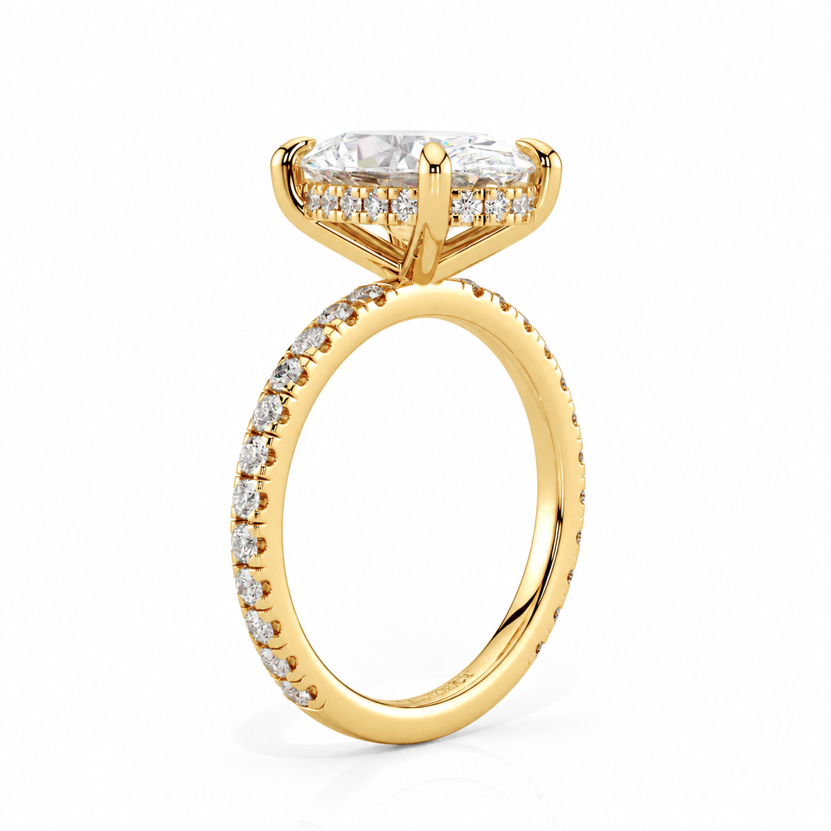 Laura oval engagement ring side profile in yellow gold
