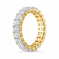 Paige radiant diamond eternity band angle view in yellow gold